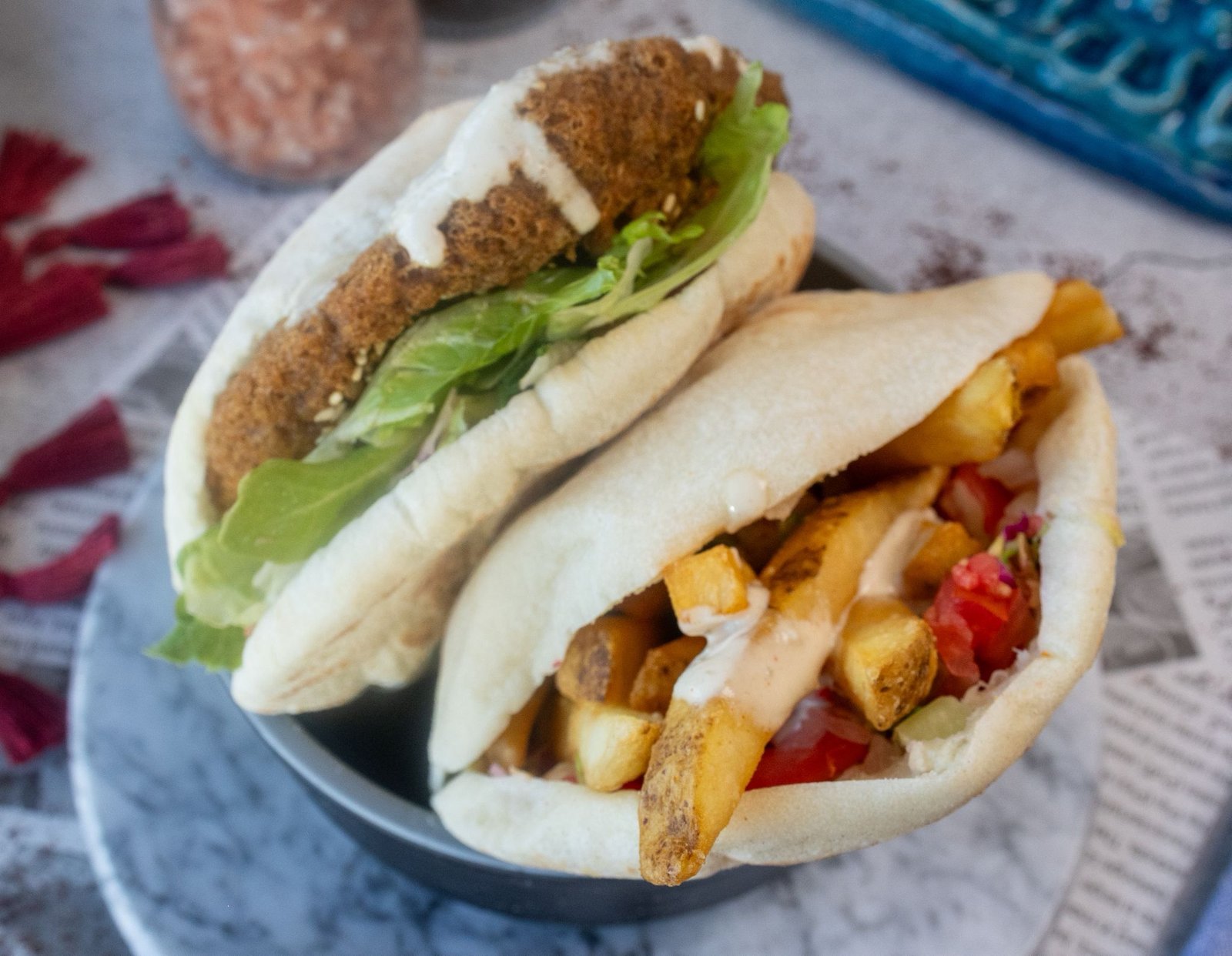 Falafel and fries pita sandwiches in homemade pita bread